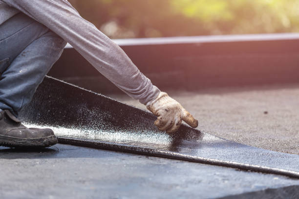 Professional Waterproofing technician working in Urbana, MD
